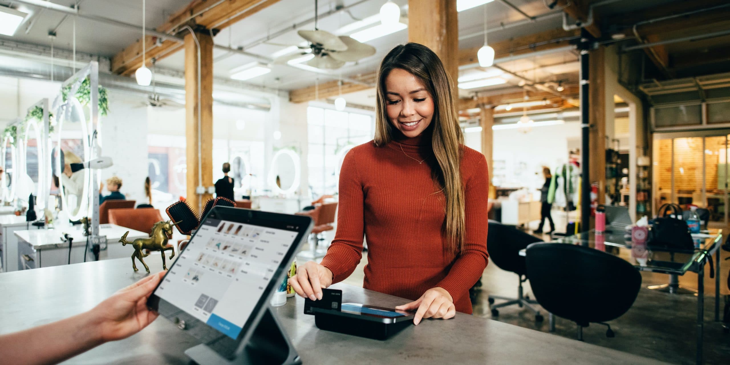 Women Using Loyalty Programme Card